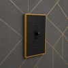 Halle Matte Black w/ Champagne Bronze Border Cast - 1 Rocker / 1 Duplex Wallplate