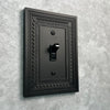 Filigree Border Matte Black Cast - 2 Rocker Wallplate