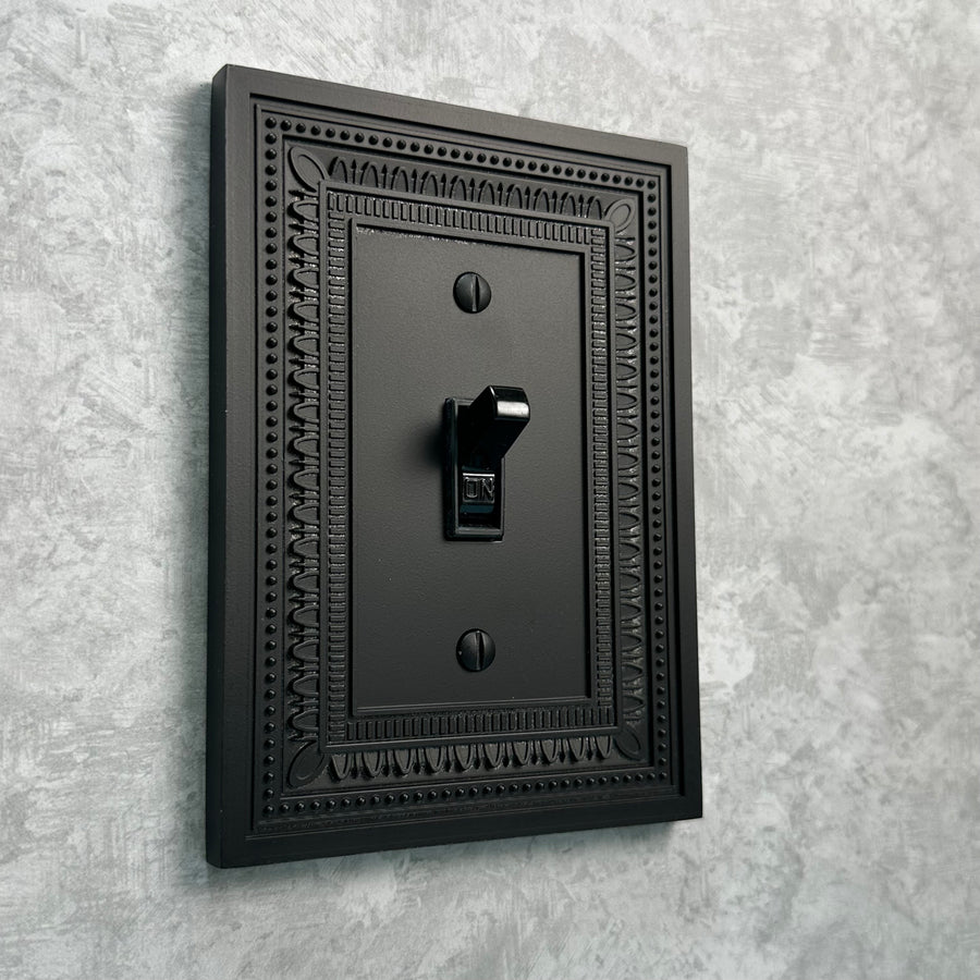 Filigree Border Matte Black Cast - 1 Toggle Wallplate