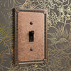 Imperial Bead Tumbled Aged Bronze Cast - 2 Toggle / 1 Duplex Wallplate
